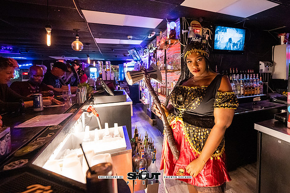 Off-Stage Halloween Havoc at The Wormhole photo by Valentin Sivyakov